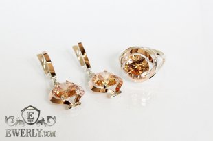 Женский комплект с коричневыми камнями: серёжки и кольцо, фото