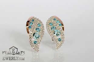Женские серьги из серебра с золотом и светло-голубыми камнями, фото