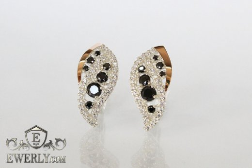 Женские серьги из серебра с золотом и чёрными камнями, фото